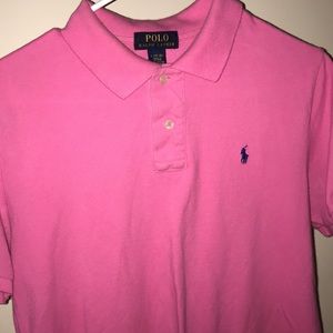 Pink polo shirt.